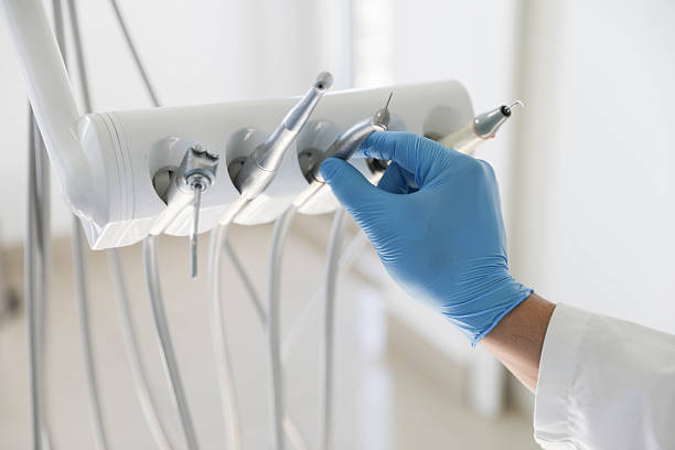 Professional Emergency Dentist technician working in Hilbert, WI